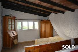 Rustic country house of natural stone in Algaida