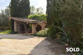 Rustic country house of natural stone in Algaida