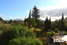 Rustic country house of natural stone in Algaida