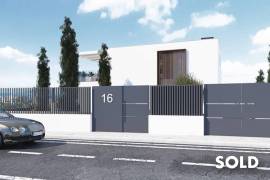 Building plot with construction project and partial sea views