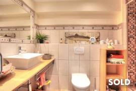Renovated duplex with partial sea views